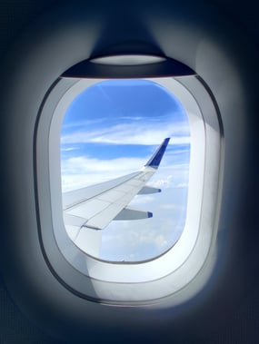 airplane window over wing